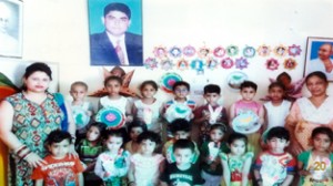 Children posing for a group photograph during the concluding ceremony of Summer Camp at Akhnoor in Jammu.