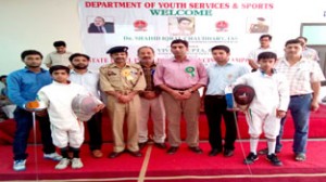 DDC Reasi Dr Shahid Iqbal Chaudhary and other dignitaries posing alongwith the fencers in Reasi on Saturday.
