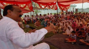 MLA Surjit Singh Slathia addressing public gathering at Barota Camp on Saturday.