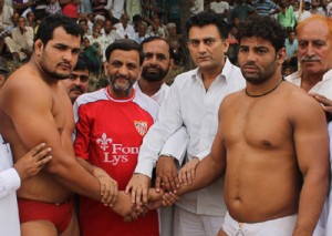 Wrestlers being felicitated by the dignitaries in Jammu on Tuesday.