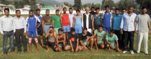 Winners posing for a group photograph during Annual Sports Meet at Sports Stadium in Poonch.