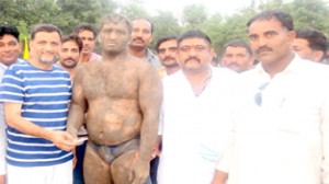 Wrestler being felicitated by the chief guest at Bhabber in Reasi. 