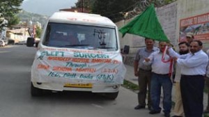 DC Mubarak Singh flagging off children for cleft surgery.