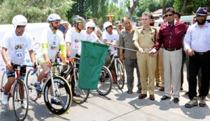 IGP Kashmir, AG Mir flagging off Triathlon in Srinagar on Tuesday.