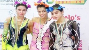 Gymnasts Mitali of J&K (L), Prabhjot of Punjab (Centre) and Palak Kour of J & K (R) posing for a group photograph.