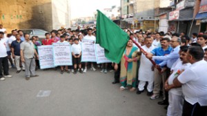 Deputy Commissioner, Samba, R K Verma, flagging off the marathon in Jammu on Thursday.