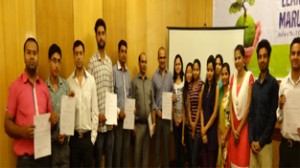 Participants in a seminar on ‘Steps to Improve English’ at Jammu on Monday.