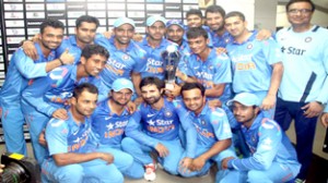 Team India players posing with series trophy at Mirpur in Bangladesh on Thursday.