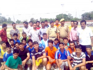 Winners posing for a group photograph during a volleyball match organized by JKP in Kathua.  