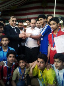 Winners of Shah-e-Hamdan Football Tournament receiving trophy from Ambassador of Tajikistan, Syed Beg Saidov in Srinagar.