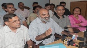 Ram Kumar Sharma interacting with media persons at Jammu on Sunday.-Excelsior/Rakesh