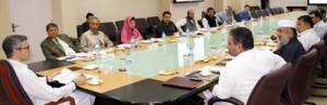 Chief Minister Omar Abdullah chairing State Haj Committee meeting at Srinagar on Tuesday.