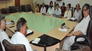 Minister for Higher Education Mohd Akbar Lone chairing a meeting at Jammu on Monday.