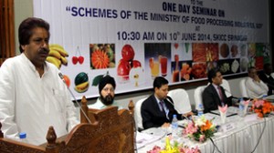 Minister for Horticulture Raman Bhalla addressing a seminar at SKICC on Tuesday.