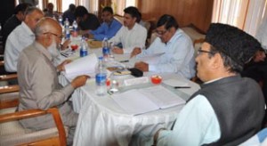 Minister for Finance, Abdul Rahim Rather chairing State Financial Corporation meeting at Srinagar on Saturday.