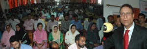 Minister for CAPD Ch Mohd Ramzan addressing educational conference at Handwara on Friday.