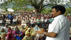 Minister of State for Fisheries, Dr Manohar Lal Sharma addressing public grievances camp at Ramkote on Wednesday. 