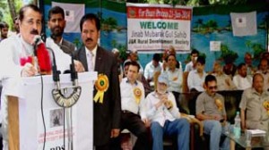 Speaker Legislative Assembly Mubarak Gul addressing a function at Uri on Sunday.