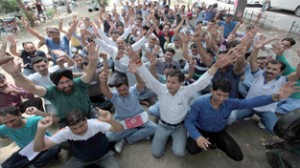 ReZs protesting near Press Club on Monday. -Excelsior/Rakesh