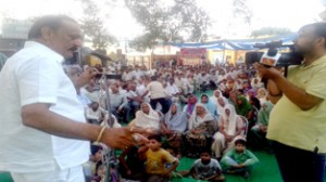 MLA, Surjit Singh Slathia addressing public gathering at Vijaypur on Wednesday.