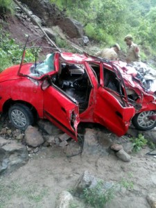 Debris of ill-fated car which rolled down from bridge near Pouni in Reasi on Friday. —Excelsior/Mengi