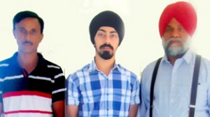 Milan Pal Singh posing alongwith his coach and president of Association.