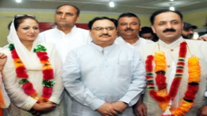 Dr Hina Shafi Bhat and others joining BJP at Srinagar on Saturday. -Excelsior/Amin War