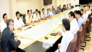 Chief Minister Omar Abdullah chairing a meeting at Srinagar on Thursday.