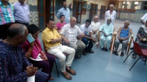 Divisional Commissioner Shantmanu interacting with inmates of old age home on Thursday.