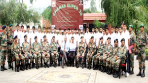 The officers of White Knight Corps along with 30 economically poor students posing for photograph on Saturday.