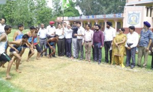 Youth participating in physical exercise in a pre-recruitment training programme at Kathua. 