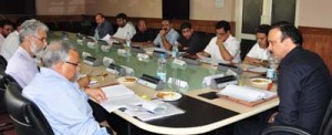 MoS Industries Sajjad Ahmad Kichloo chairing Board of Directors meeting of SICOP at Srinagar on Thursday.