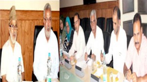 Minister for Rural Development Ali Mohammad Sagar and Minister for Health, Taj Mohi-ud-Din chairing a meeting at Srinagar on Wednesday.