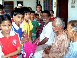 The students of Model Academy interacting with inmates of Old Age Home, Ambphalla in Jammu.