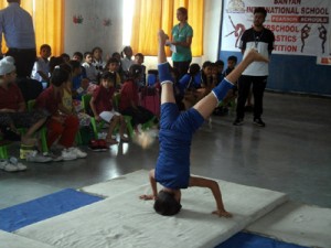 Gymnast displaying skill during Inter-School Gymnastics Competition at Banyan International School. 