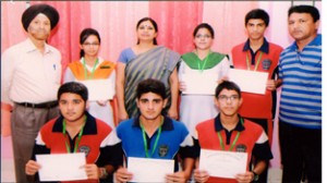 Medal winners of DPS Jammu posing for a group photograph alongwith School management.