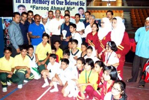 Winners posing for a group photograph during the concluding ceremony of District Srinagar Wushu Championship.