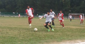 Footballers at their best in getting hold of the ball at Polo Ground in Srinagar.