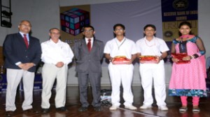 Winners of City Round of the third RBI Quiz Competition posing alongwith the dignitaries on Wednesday.