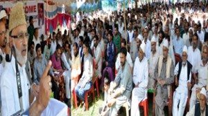 Minister for Rural Development, Ali Mohammad Sagar addressing public gathering at Narbal on Thursday.