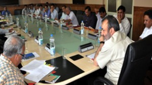 Chief Secretary Mohd Iqbal Khandey chairing Committee of Secretaries meeting at Srinagar on Monday.