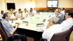 Chief Secretary Mohammad Iqbal Khandey chairing a meeting at Srinagar on Tuesday.