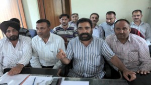 PHE employees leader Subash Verma addressing press conference in Jammu.  -Excelsior/Rakesh