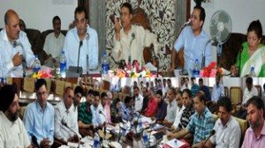 Minister for CAPD Ch Mohd Ramzan chairing a meeting of officers at Srinagar on Monday.