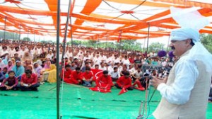 Former Minister & MLA Surjeet Singh Slathia addressing a gathering at Purmandal on Sunday.