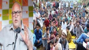 Minister for PWD, Abdul Majid Wani addressing a public gathering on Monday.