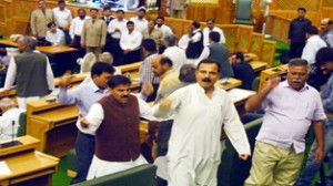 MLAs of BJP and National Panthers Party (NPP) shouting  slogans in Legislative Assembly on Tuesday.         —Excelsior/Amin War