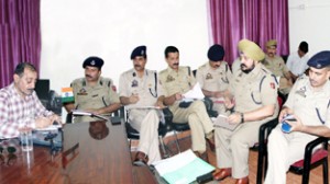 IGP Railways Mohd Sulaman Salaria chairing a meeting of officers at Jammu on Sunday.