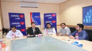 Aircel representatives at a press conference at Jammu on Tuesday. -Excelsior/Rakesh