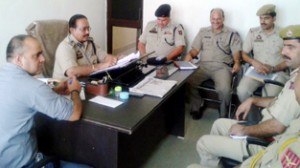 SSP Railways, Abhay K Mahajan chairing a meeting of officials at Katra on Friday.